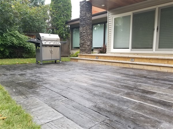 Why Interlocking Paver Patios Are More Beneficial Than Stamped Concrete Seasonal Solutions